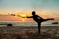Fire dancer against sunset Royalty Free Stock Photo