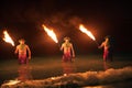 FIre Dancers in the Hawaiian islands at night Royalty Free Stock Photo