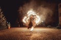 Fire dancing shows at night. Amazing fire show as part of wedding ceremony