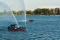 Fire department boat spraying water on river Don Royalty Free Stock Photo