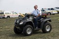 A fire department medic responds to an emergency at a festival in a dune buggy ,