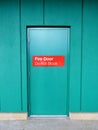 Fire Door Do Not Block sign and emergency exit Royalty Free Stock Photo