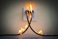 On fire electric wire plug Receptacle wall partition Royalty Free Stock Photo