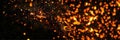 Fire embers particles over black Royalty Free Stock Photo