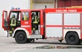fire engine carrying two firefighters Royalty Free Stock Photo
