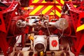 Fire engine close-up with pump hoses connectors Royalty Free Stock Photo