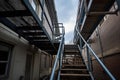 fire escape stairs with signs of forced entry