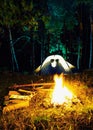 Fire in the evening at the tent in which the couple in love Royalty Free Stock Photo