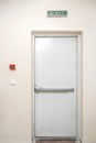 Fire exit door in condominium or apartment for emergency fire alarm Isolated on white Royalty Free Stock Photo
