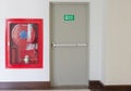 Fire exit door and fire extinguish equipment Royalty Free Stock Photo