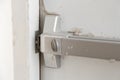 Fire exit door handle close-up. selective focus Royalty Free Stock Photo