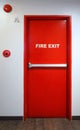 Fire exit emergency door red color metal material. Royalty Free Stock Photo