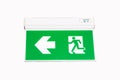 Fire exit green emergency exit sign isolated on white background. Royalty Free Stock Photo