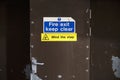 Fire exit keep clear sign on construction building site door Royalty Free Stock Photo