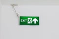 Fire Exit Signs, Fire escape green, Arrow Signs on white wall, Signs Emergency, Light box signs green, Safety first signs Royalty Free Stock Photo