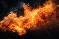 Fire explosion on black background. Yellow and orange flame after a blast, fiery background Royalty Free Stock Photo