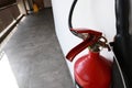 A fire extinguisher is an active fire protection device used to extinguish or control small fires, Royalty Free Stock Photo
