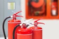 Fire extinguisher, Close-up red fire extinguishers tank in the building for fire equipment for extinguishing or protection and Royalty Free Stock Photo