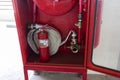 Fire extinguisher and fire hose reel Royalty Free Stock Photo