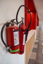Fire extinguisher and gas pump system on the wall. Powerful emergency fire extinguisher equipment. Fire retardant. Fireproof. Royalty Free Stock Photo