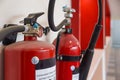 Fire extinguisher and gas pump system on the wall. Powerful emergency fire extinguisher equipment. Fire retardant. Fireproof. Royalty Free Stock Photo