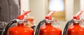 Fire extinguisher has hand engineer checking pressure gauges to prepare fire equipment for protection and prevent in emergency Royalty Free Stock Photo