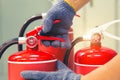Fire extinguisher has hand engineer inspection checking handle of Fire extinguishers Royalty Free Stock Photo