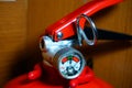 Fire extinguisher ready to extinguish, safety and protection in case of fire. Royalty Free Stock Photo