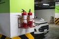 Fire extinguisher in underground basement car parking Royalty Free Stock Photo
