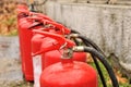 Fire extinguishers lined up before practice use