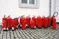 A row of fire extinguishers Royalty Free Stock Photo