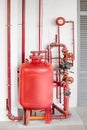 Fire extinguishing and fire alarm system with complex and intricate scheme of pipes, assemblies and a large foam tank