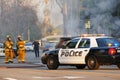 Fire fighter Extinguishing a burning car Royalty Free Stock Photo