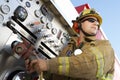 Fire Fighter Holding Hose Royalty Free Stock Photo
