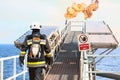 Fire fighter on oil and gas industry, successful firefighter at work , Fire suit for fighter with fire and suit for protect fire Royalty Free Stock Photo