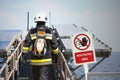 Fire fighter on oil and gas industry, successful firefighter at work , Fire suit for fighter with fire and suit for protect fire Royalty Free Stock Photo