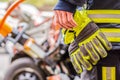 Fire fighter works with professional tools on a crashed car Royalty Free Stock Photo