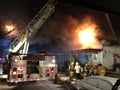 Fire fighters battling house fire