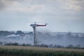 A Fire Fighting Helicopter Dumping Contents Of Water Tanks Battling Wildfire Royalty Free Stock Photo