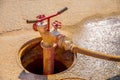 Fire-fighting system of water supply from the hatch using a hose, fire column under the hydrant Royalty Free Stock Photo