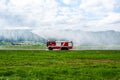 Fire fighting with water spray. Fire truck and fire engine with fire men. Emergency and conflagration. Fire disaster and crisis Royalty Free Stock Photo