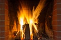 Fire in fireplace. Fire background. Blazing Bonfire. Firewood burns in a fireplace Royalty Free Stock Photo