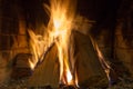 Fire in fireplace. Fire background. Blazing Bonfire. Firewood burns in a fireplace. Royalty Free Stock Photo