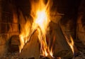 Fire in fireplace. Fire background. Blazing Bonfire. Firewood burns in a fireplace. Royalty Free Stock Photo