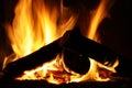 Fire in a fireplace, fire flames on a black background