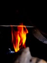 Fire flame burning wood on stove and blurred background Royalty Free Stock Photo