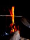 Fire flame burning wood on stove and blurred background Royalty Free Stock Photo