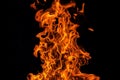 Fire flame isolated over black background, abstract texture Royalty Free Stock Photo