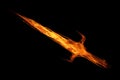 Fire flame sword isolated on black Royalty Free Stock Photo