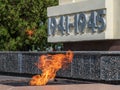 Fire flame symbol memory event monument monument town city street background traffic motor transport flames heat temperature tempe Royalty Free Stock Photo